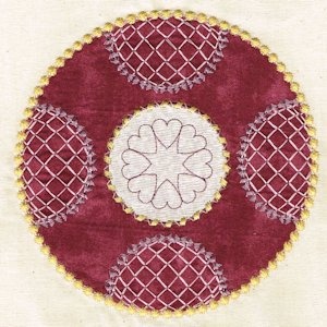 circular quilt block with applique, candlewicking, cross hatch and hearts